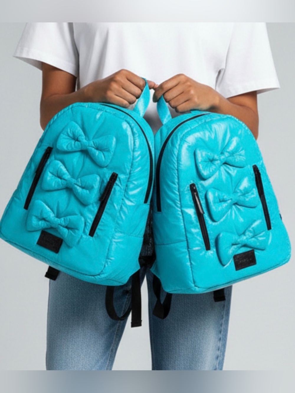 7am backpacks turquoise with bows
Bundle of two